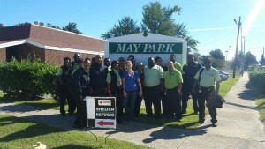 CAT staff in front of Maypark sign in Augusta