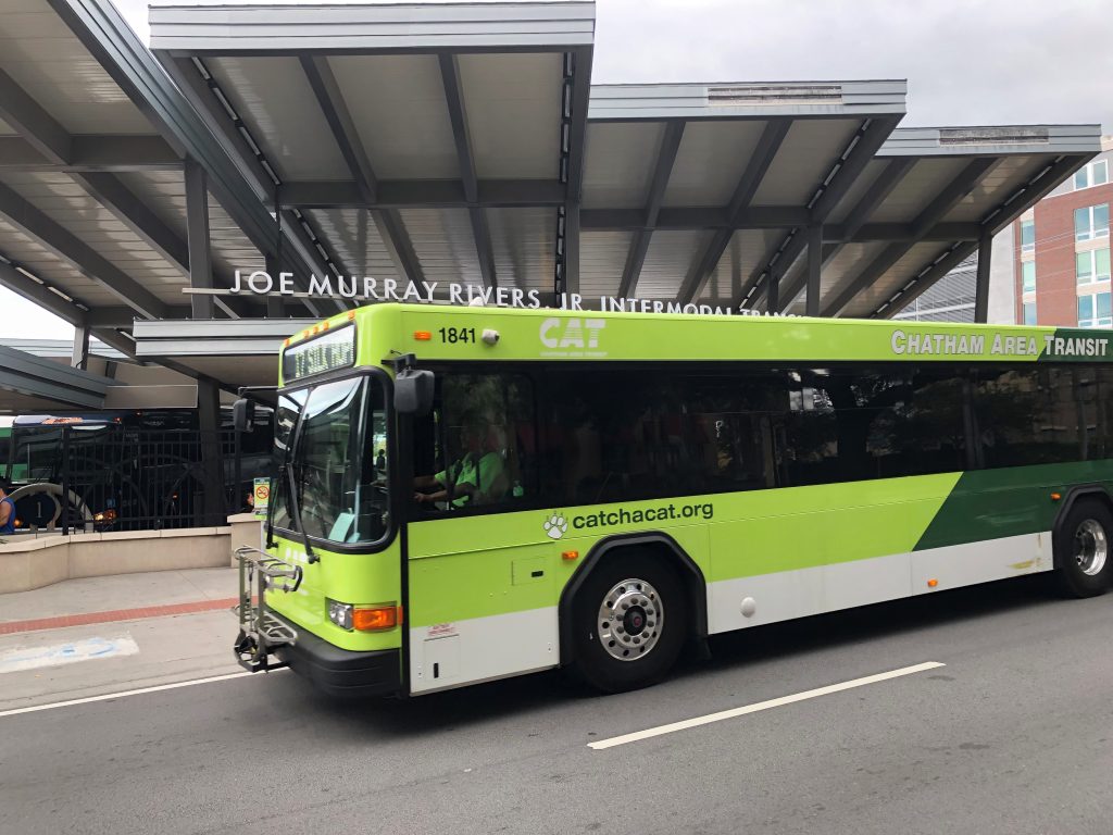 CAT bus driving by the transit center.